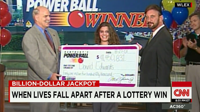 Three people holding a large Powerball winner check, illustrating unfortunate lottery stories of winning big money.