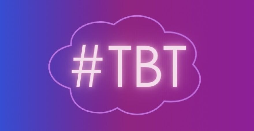 Neon "#TBT" sign in a purple cloud design, representing viral trends discussion.