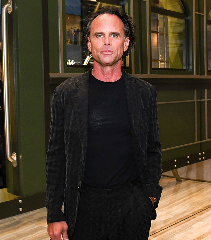 53YO Walton Goggins in a black outfit during photoshoot, capturing attention with his confident pose.