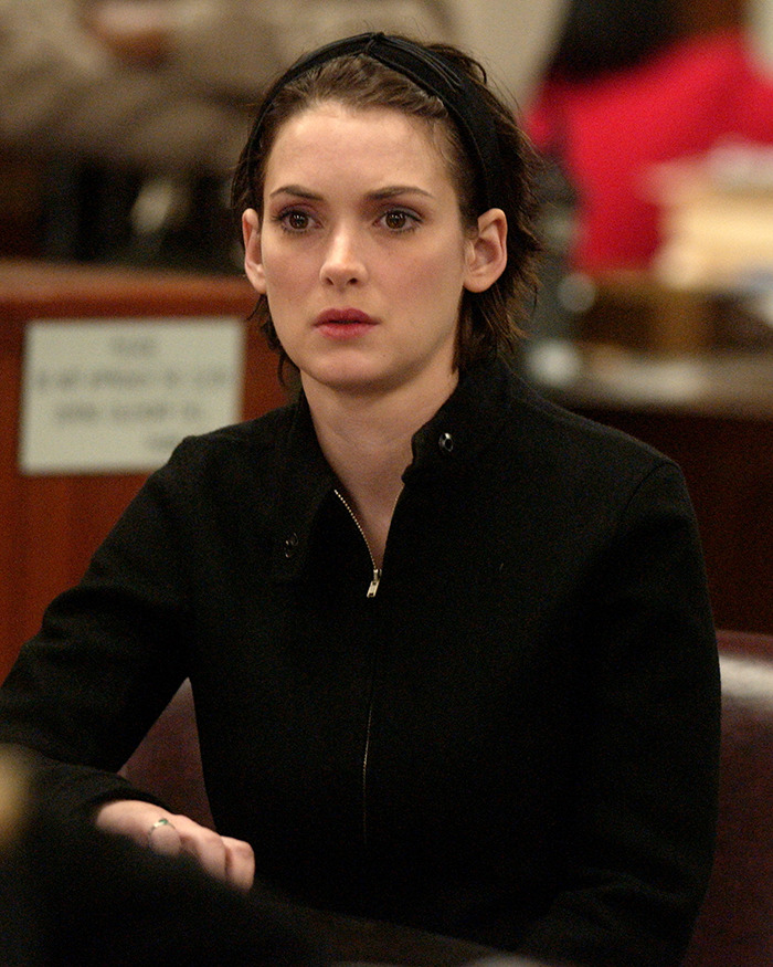 A person in a courtroom, wearing a black jacket, related to a forgotten Hollywood scandal.