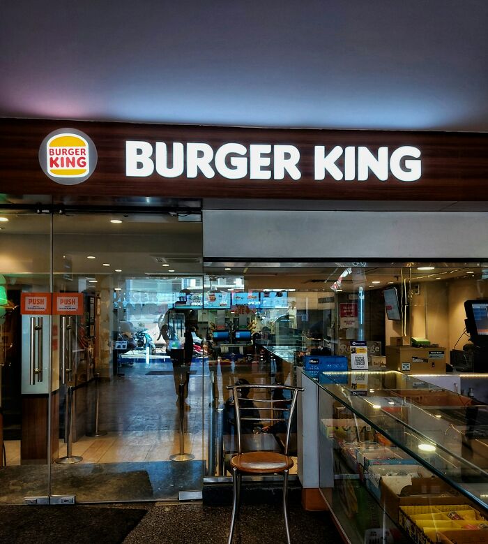 Burger King entrance with seating area, showcasing potential danger awareness through gut feelings.