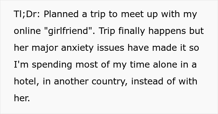 Text about a planned trip to meet an online girlfriend who has anxiety issues, leaving him alone in a hotel abroad.