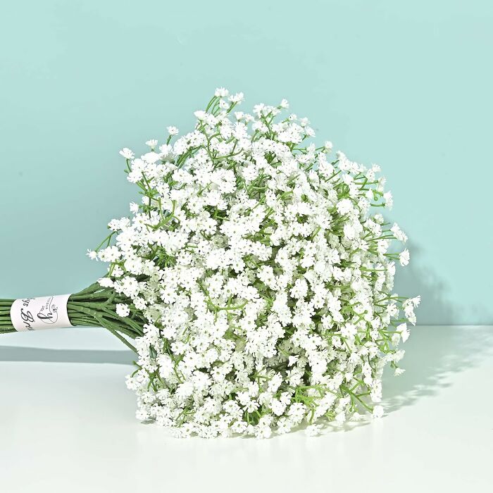 White baby’s breath bouquet on a pastel background, ideal for filling your own Easter basket arrangement.