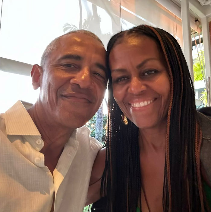 A couple smiling together indoors, highlighting marriage insights and connection.