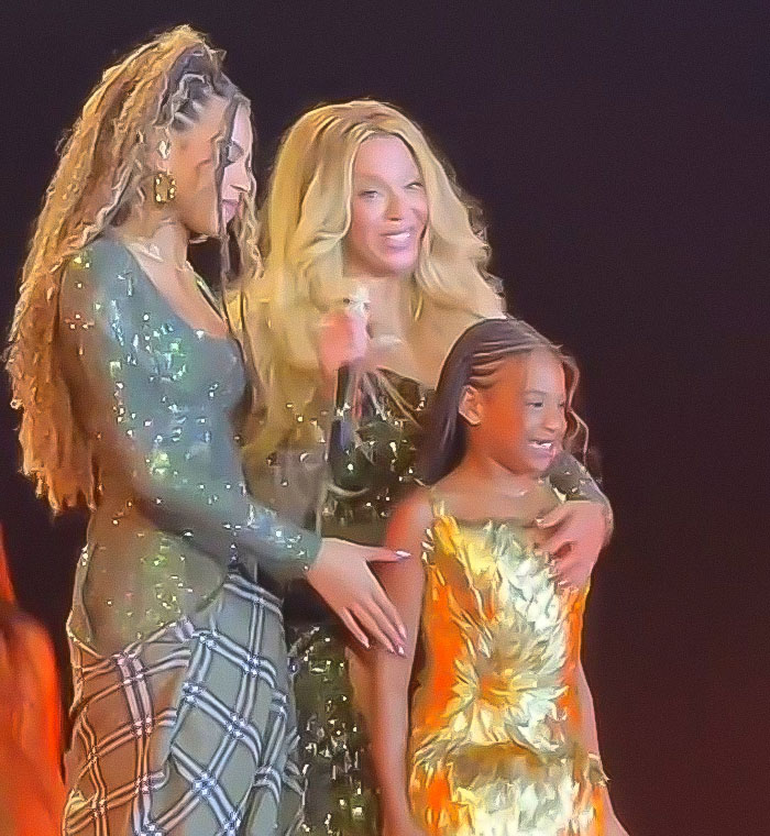 Beyonc&eacute; and Jay-Z on stage with daughter Blue Ivy performing live amid grooming accusations.