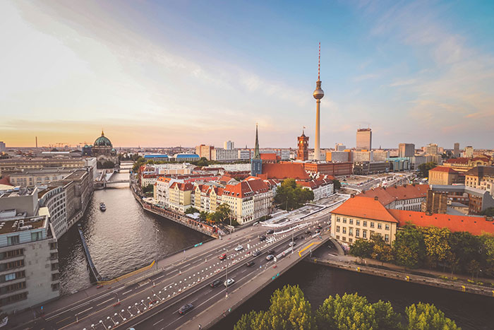 Aerial view of a European cityscape with iconic tower, showcasing architecture Europeans may not find strange.