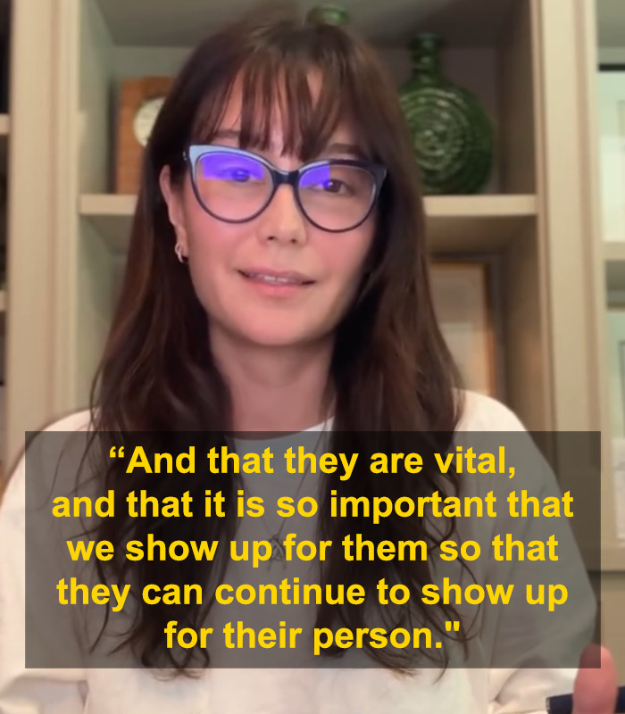Bruce Willis’ wife discusses dementia support, wearing glasses and a white shirt at home with quote overlay. Bruce Willis’ wife discusses dementia support, wearing glasses and a white shirt at home with quote overlay.