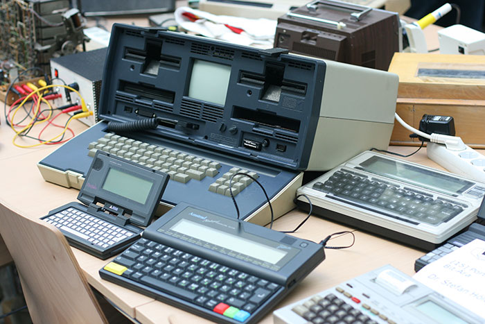 Collection of old electronic devices symbolizing companies once successful until a single bad decision impacted them.