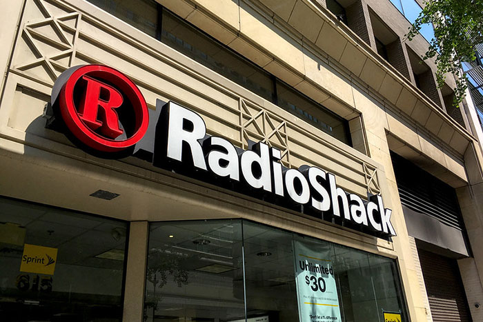 RadioShack storefront representing companies that were successful until a single bad decision caused decline.
