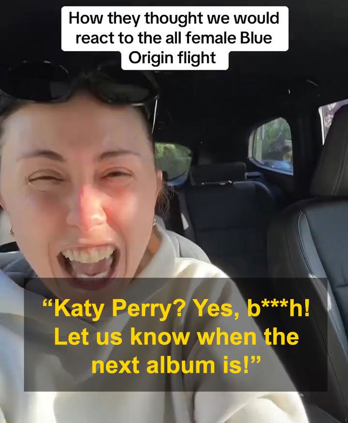 A woman humorously reacts in a car, satirizing public reactions to Katy Perry's Blue Origin flight. A woman humorously reacts in a car, satirizing public reactions to Katy Perry's Blue Origin flight.