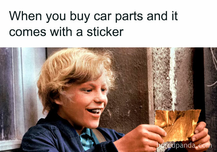 A child excitedly holding a golden ticket, captioned about car parts and stickers, relating to car memes.