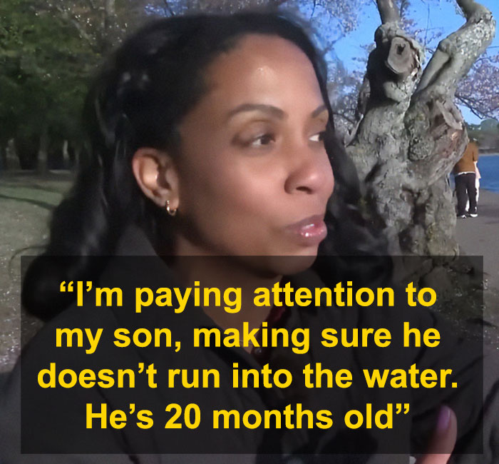 Woman discussing her son&rsquo;s safety by the water, with trees in the background.