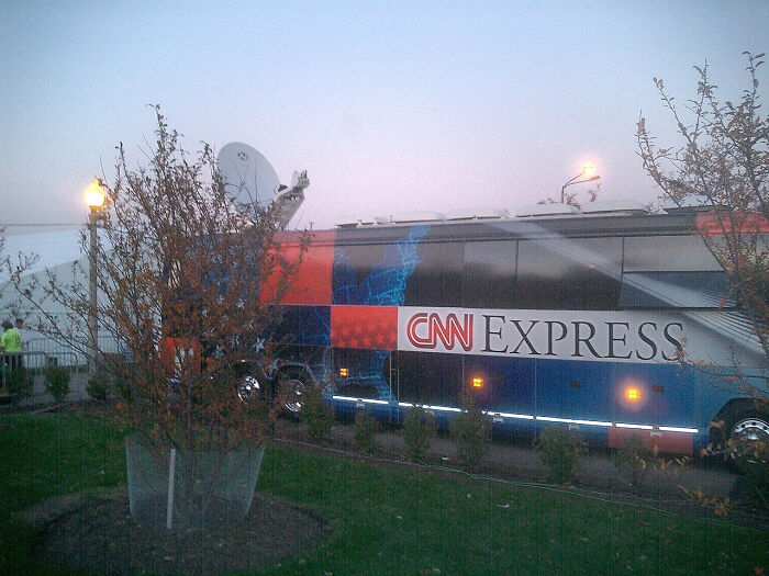 News broadcast bus parked outdoors during dusk with a satellite dish, illustrating companies that lost customers forever.