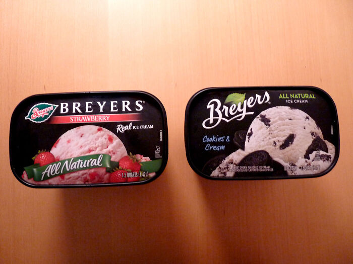 Two Breyers ice cream containers, strawberry and cookies and cream flavors, illustrating companies losing customers forever.