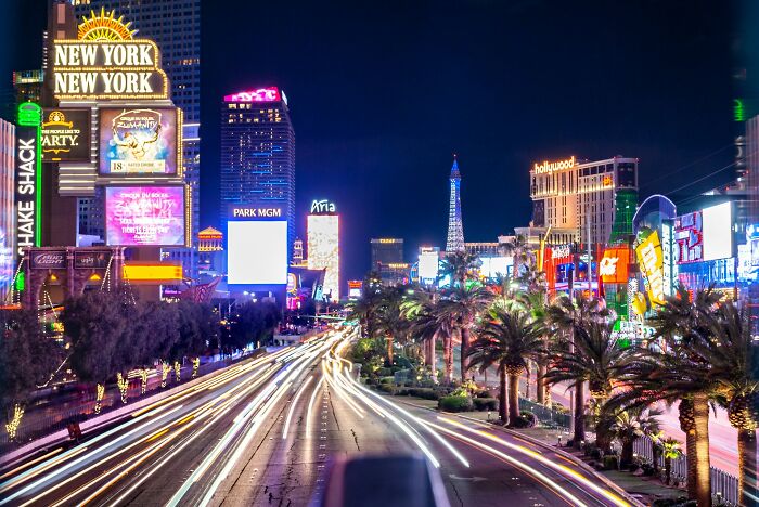 Bright lights and busy streets on the Las Vegas Strip, highlighting tourism and nightlife, look less appealing to locals.