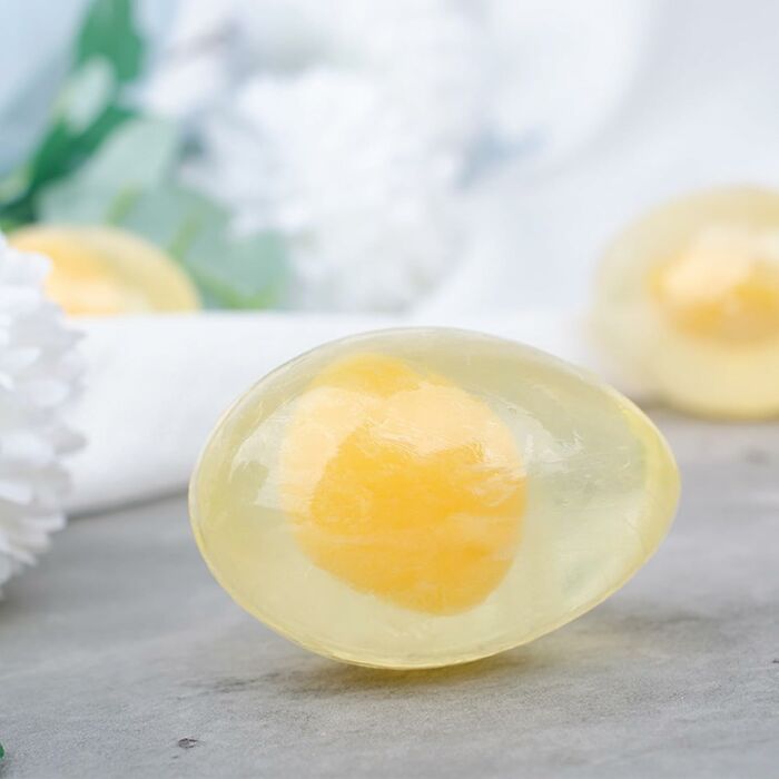 Yellow Easter treat shaped like an egg, perfect for personal Easter baskets.