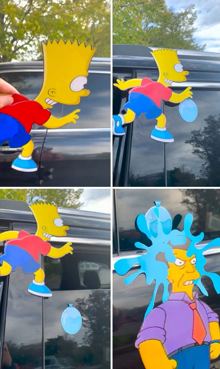 Simpsons paper cutouts on a car, depicting a water balloon scene with Bart and a splashed character.