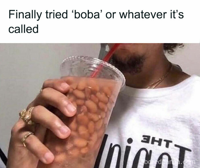 A man humorously drinks a cup filled with beans, captioned "Finally tried ‘boba’ or whatever it’s called."