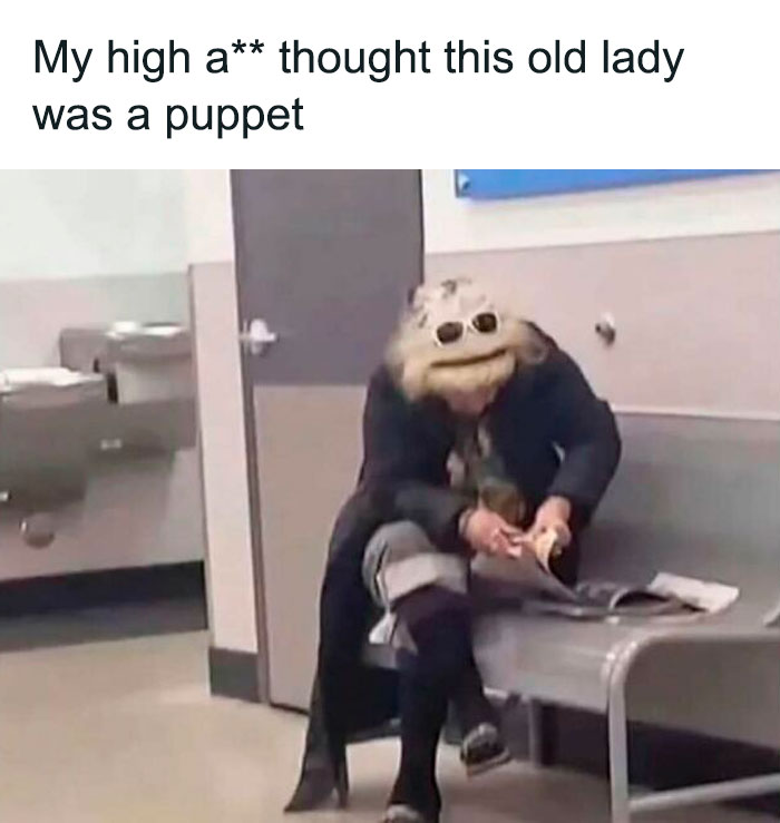 Woman in fur hat and coat sitting on a bench, humorously resembling a muppet character.