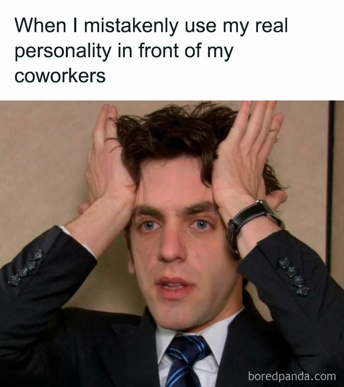 Man in suit with hands on head, looking stressed. Captioned as funny relatable work meme.