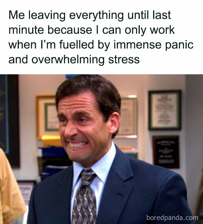 A man grimacing humorously in an office setting, conveying funny relatable work meme about last-minute panic.