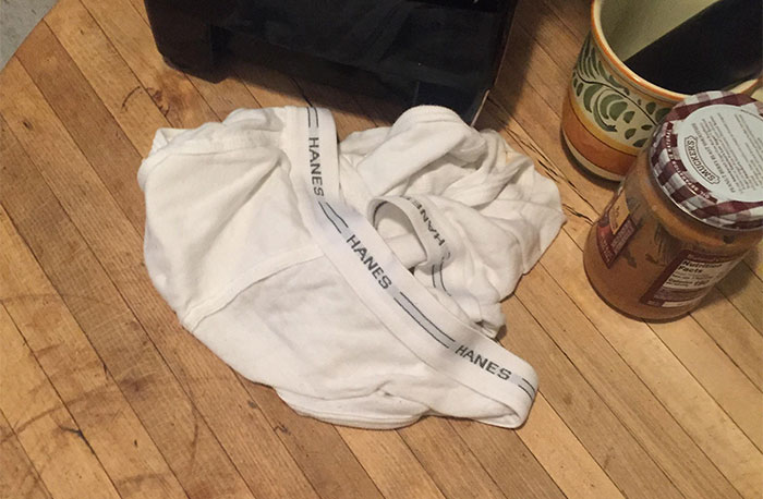 White Hanes underwear on a kitchen table, symbolizing the struggle to teach cleaning habits. White Hanes underwear on a kitchen table, symbolizing the struggle to teach cleaning habits.