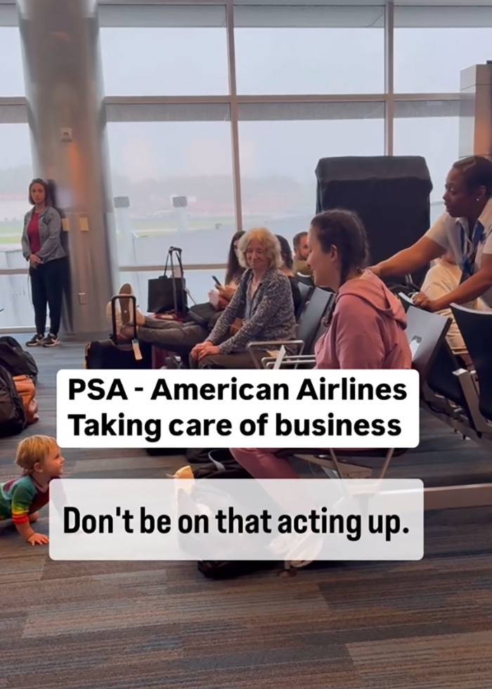 Airlines worker gives speech to waiting passengers after 8-hour delay at airport gate.