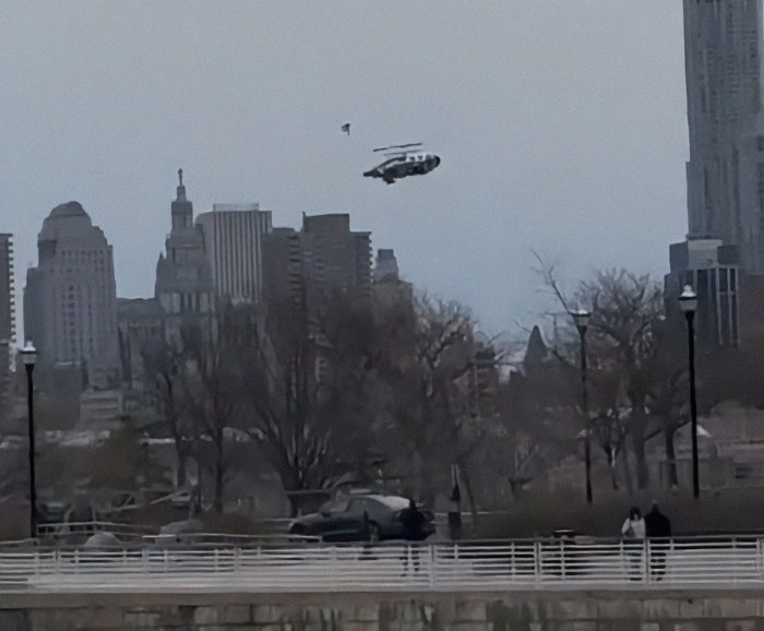 Helicopter flying over New York skyline, related to crash involving tech boss family.