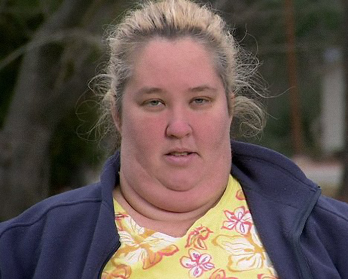 Woman in a floral shirt and dark jacket outside, associated with "Honey Boo Boo" life events.