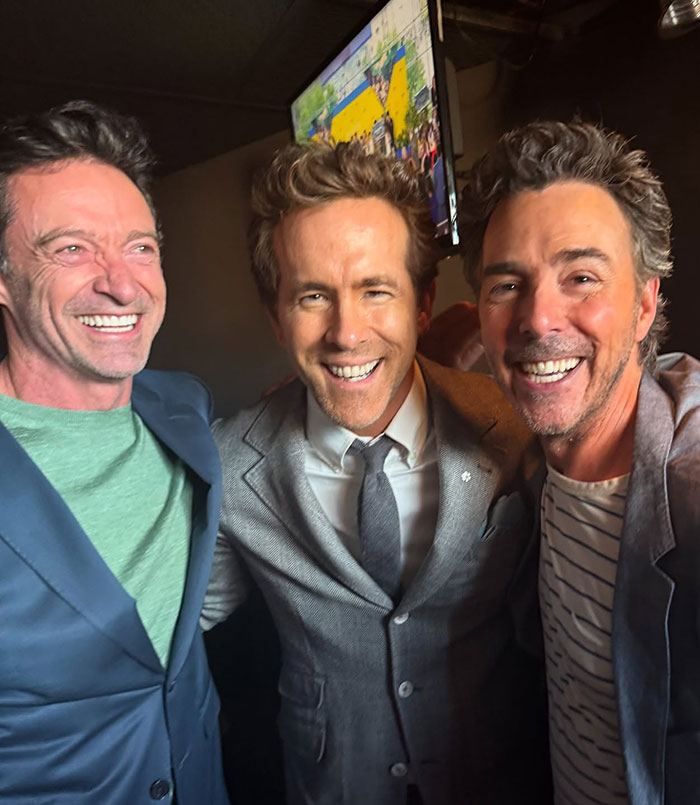 Hugh Jackman and Ryan Reynolds smiling together with a friend, fans urge Hugh Jackman to stay away from Ryan Reynolds. Hugh Jackman and Ryan Reynolds smiling together with a friend, fans urge Hugh Jackman to stay away from Ryan Reynolds.