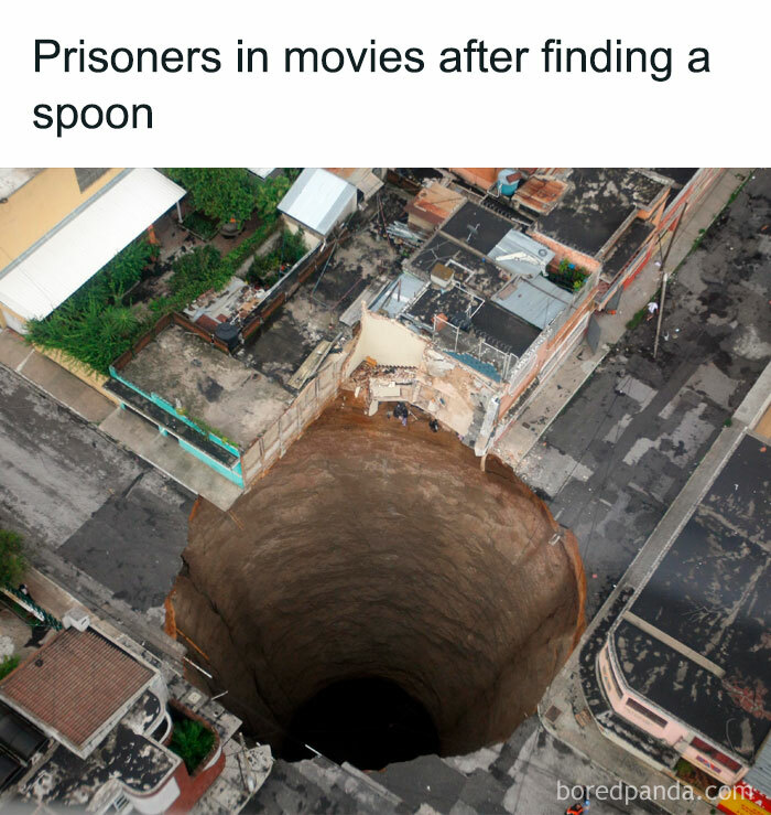 Aerial view of a large sinkhole in an urban area with humorous sarcasm caption above.