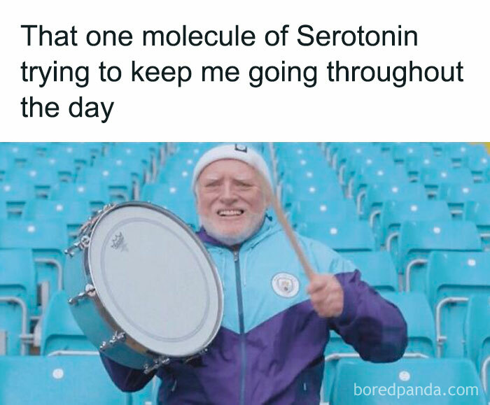 Elderly man humorously playing a drum with enthusiasm in an empty stadium, illustrating a funny sarcasm meme.