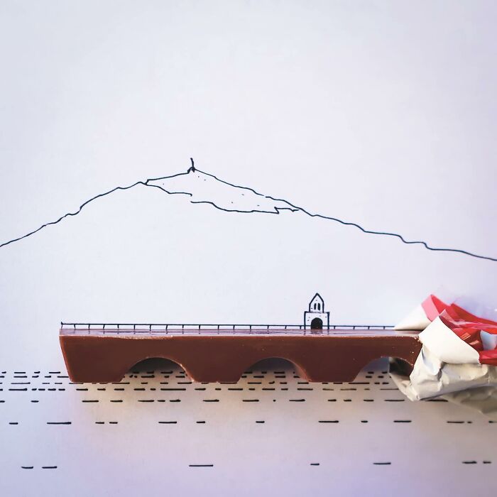 Playful illustration by Romain Joly featuring a chocolate bar as a bridge integrated with a mountain drawing.