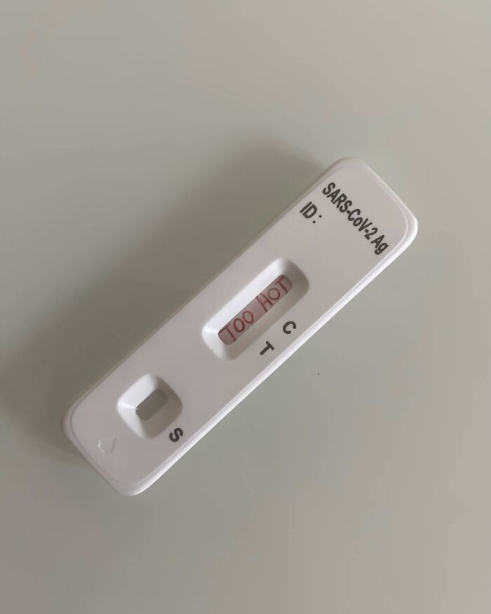 Artistic transformation of a test kit with "TOO HOT" message, showcasing thought-provoking creativity.