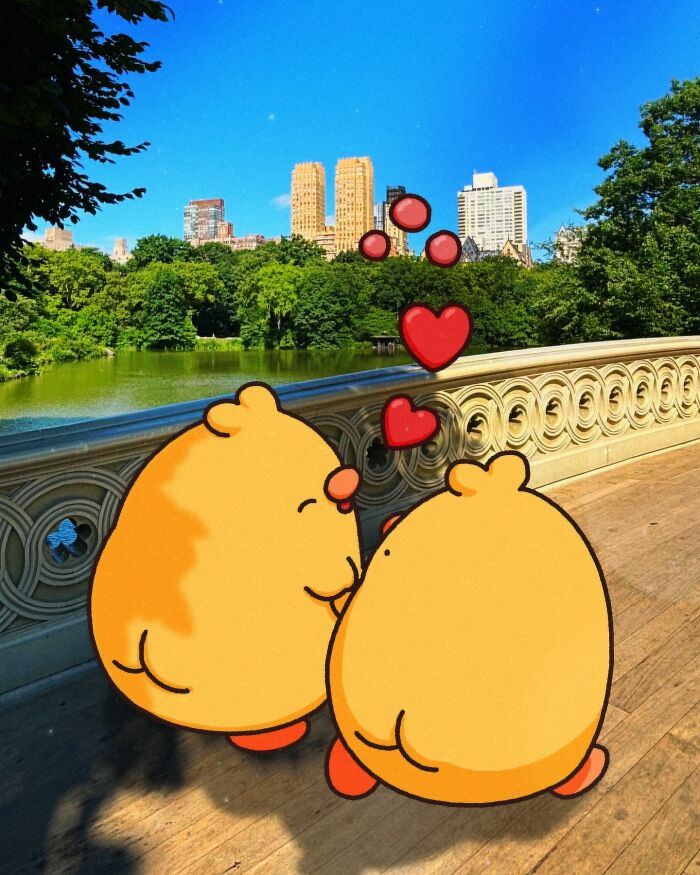 Cartoon characters on a bridge with city skyline and hearts floating above them, showcasing the charm of Birb, Bread, and Poku.