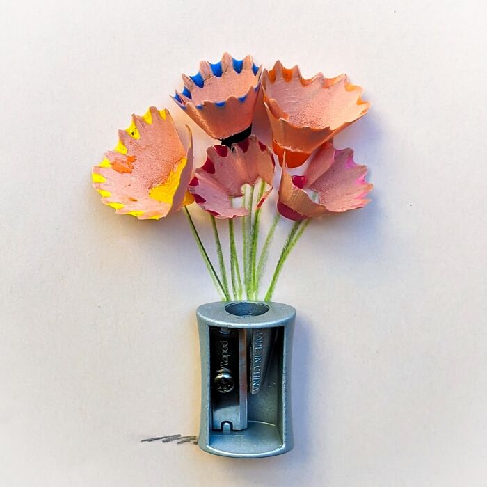 Playful illustration by Romain Joly with colored pencil shavings as flowers and sharpener as vase.