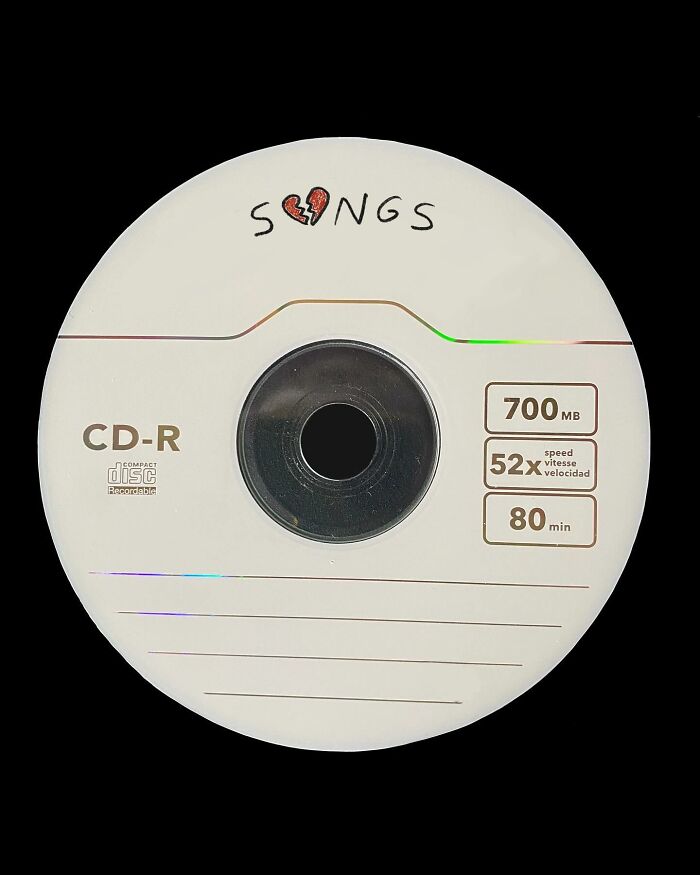 CD transformed into artwork with "Songs" and heart design.