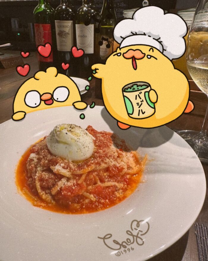 Cute cartoon birds dining with pasta and wine, featuring Birb and Bread.