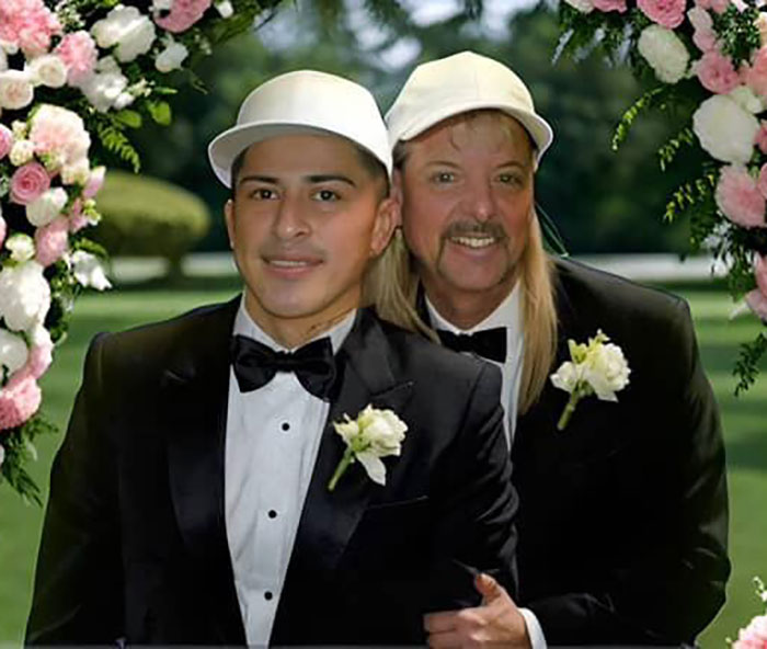 Two men in tuxedos, smiling under a floral arch, suggest a wedding ceremony behind bars for Tiger King star.