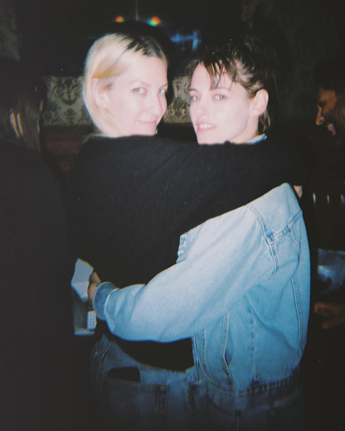 Lovebirds embrace in intimate wedding snap, showcasing affection and happiness at their celebration.