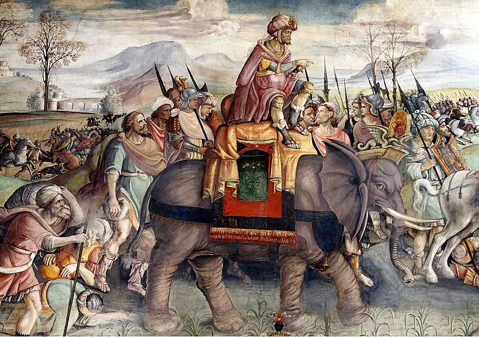 Historic battle scene with leaders on elephant and soldiers, depicting last-minute decisions that impacted the course of history.