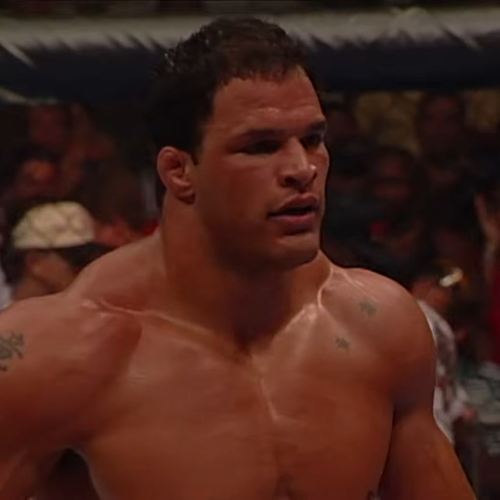 Muscular man in a wrestling ring, sparking confusion about Dwayne Johnson's look in an upcoming movie.