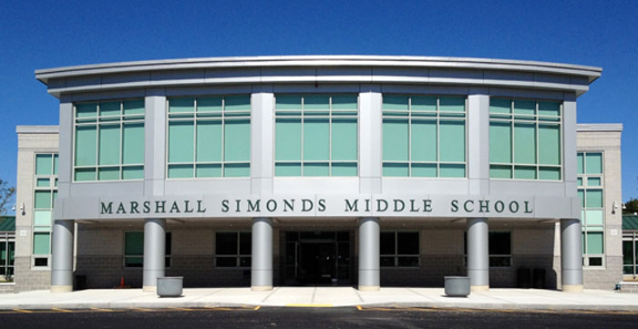 Front view of Marshall Simonds Middle School building, related to parent concerns over explicit survey questions.