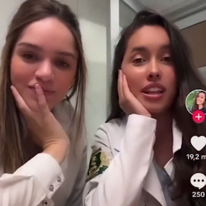 Two med students in a selfie video. Two med students in a selfie video.