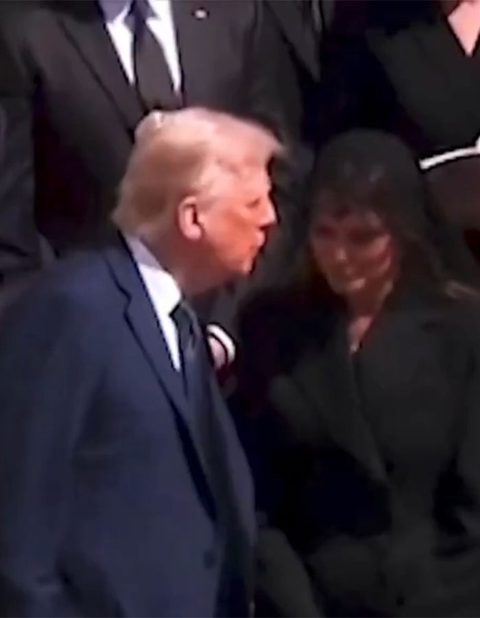 Donald Trump listens as Melania whispers during Pope Francis' funeral, captured by a lip reader.