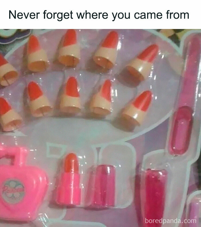 Toy set with red claws and lipstick against a humorous backdrop. Millennial misery vibes.