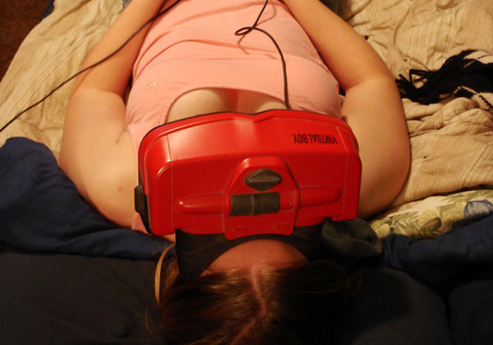 Person using a Virtual Boy headset, an example of the next big thing that turned out to be a flop.