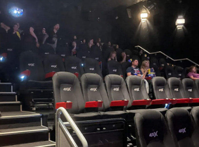 Empty 4DX cinema seats under dim lighting, illustrating a flop of "the next big thing."