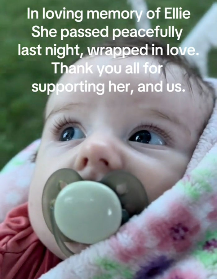 Baby with a pacifier wrapped in a blanket, memorial text overlay. Influencer's daughter passes away at 10 months old.