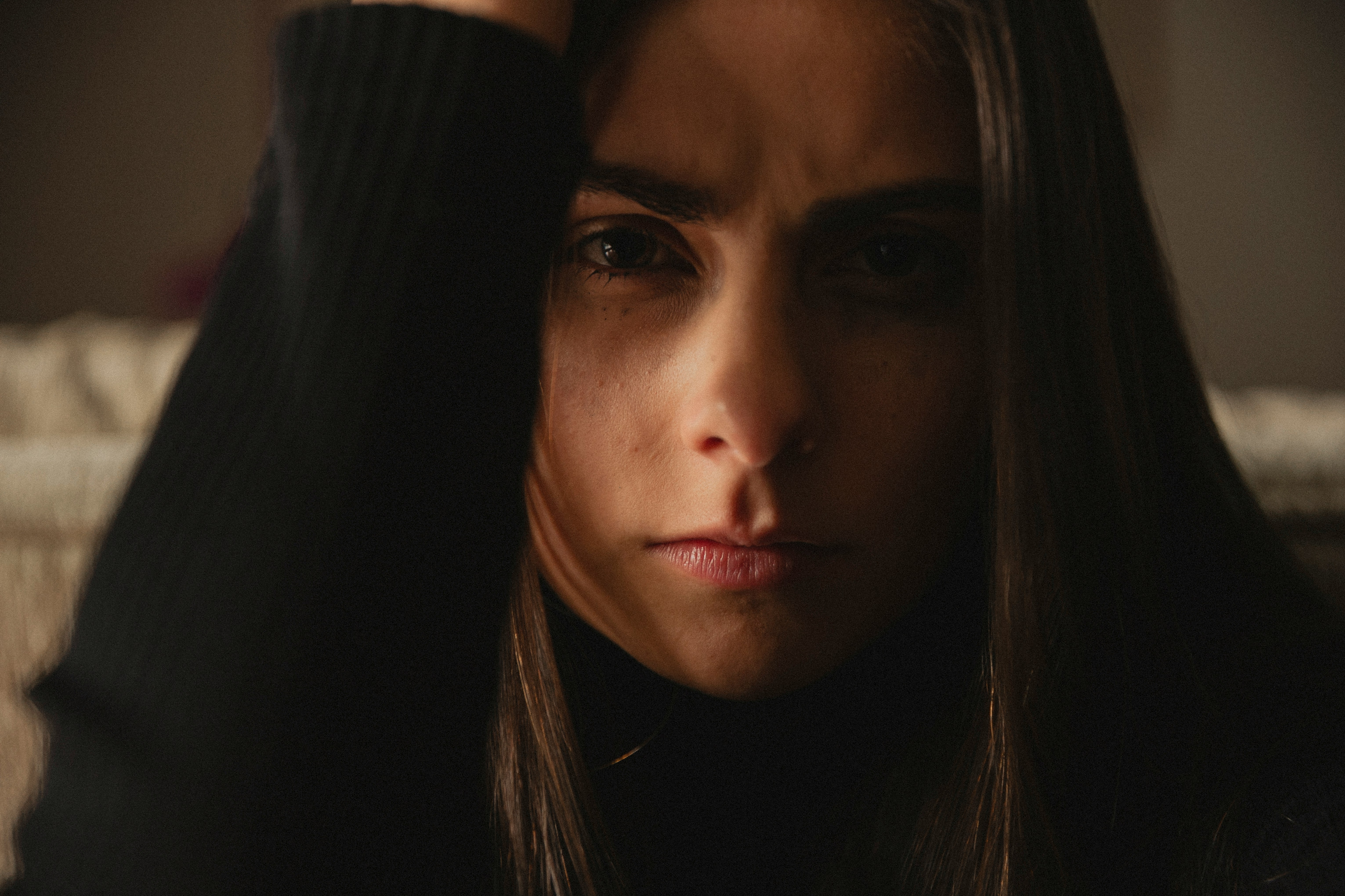 Woman looking serious, highlighting relationship affair chaos during wedding rehearsal.